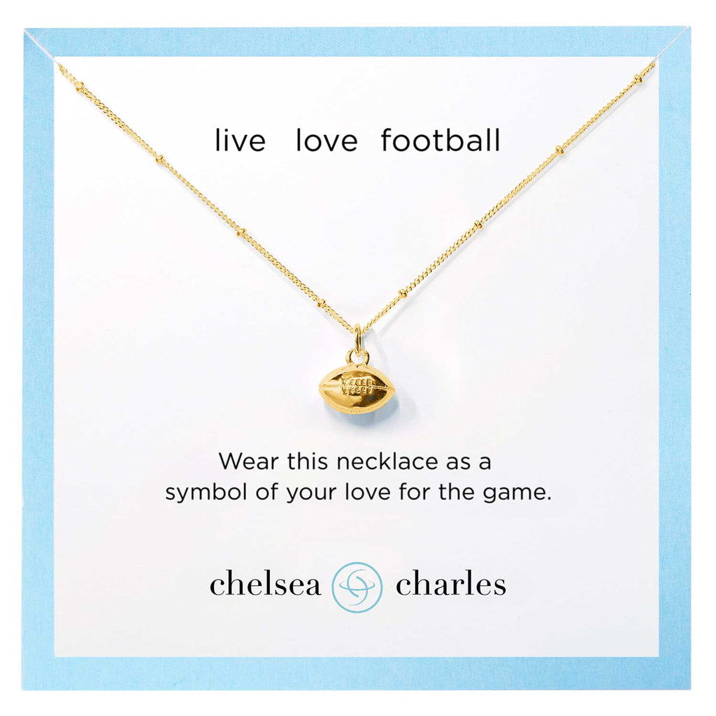 CC Sport gold football necklace by Chelsea Charles