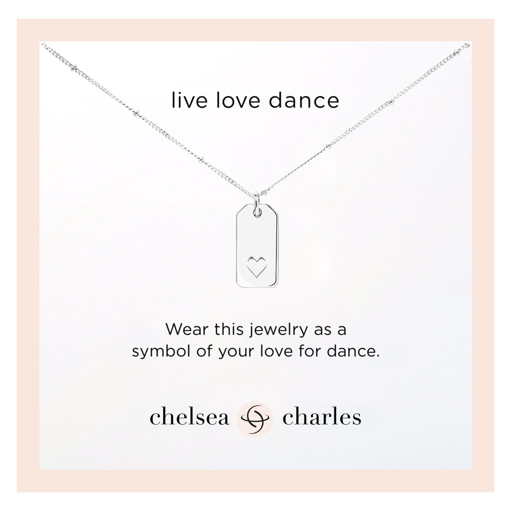 Silver Dance Reversible Charm Necklace by Chelsea Charles