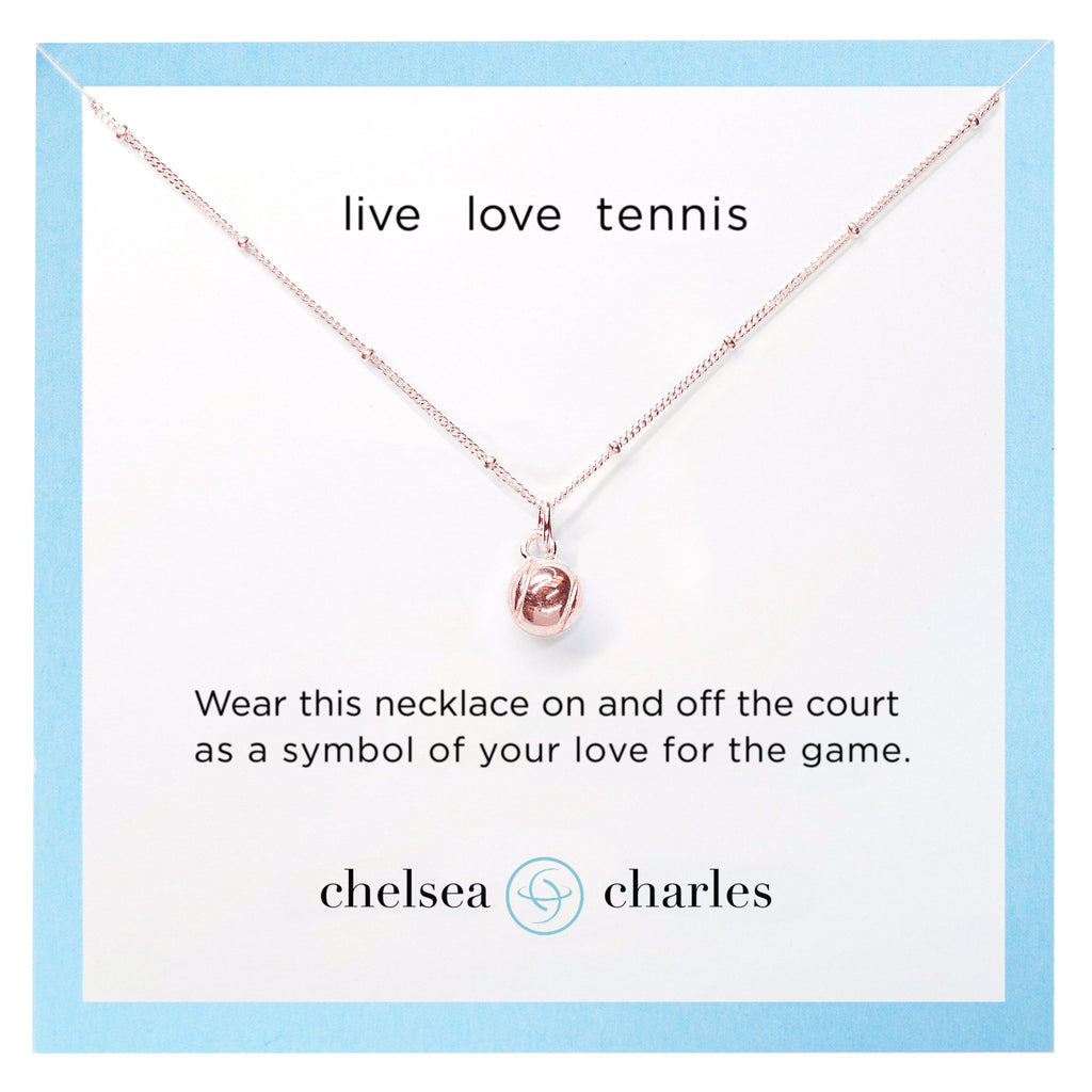 Chelsea Charles rose gold tennis ball charm necklace