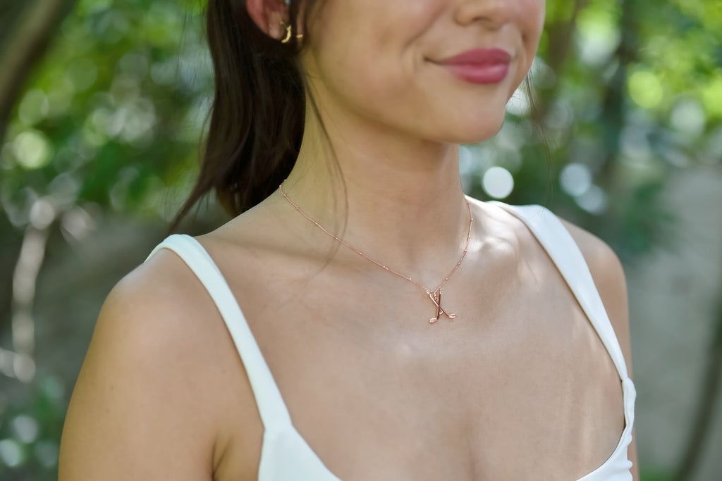 Rose Gold Ice Hockey Necklace by Chelsea Charles