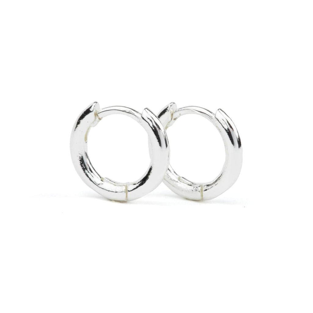 The Perfect Silver Huggie Hoop Earrings by Chelsea Charles