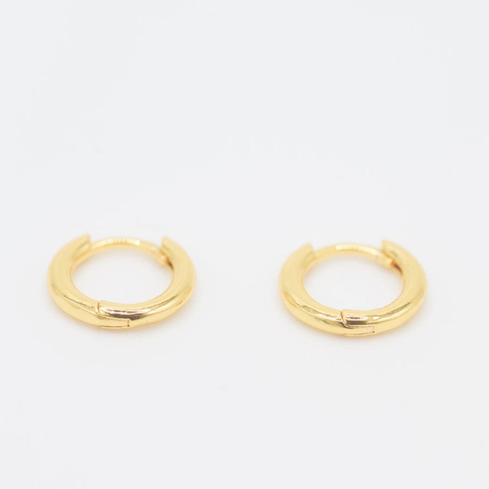 The Perfect Gold Huggie Hoops by Chelsea Charles
