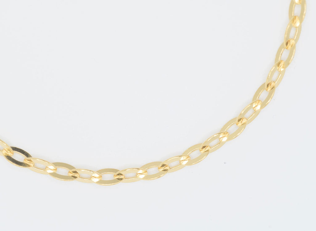 Closeup of Champion Chain Halftime Gold Necklace by Chelsea Charles