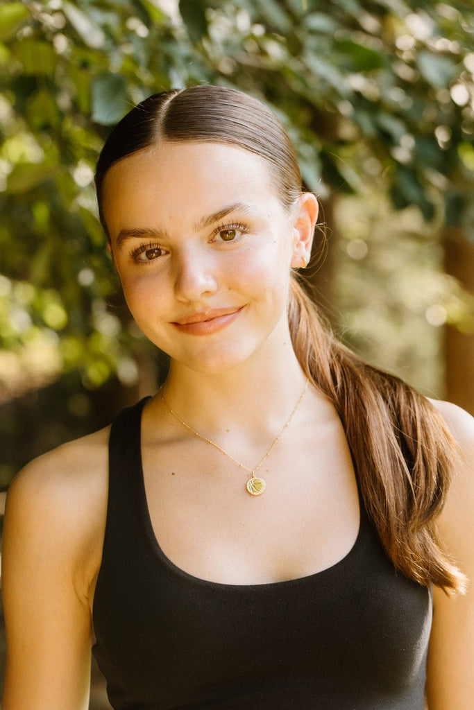 Basketball gold charm necklace by Chelsea Charles
