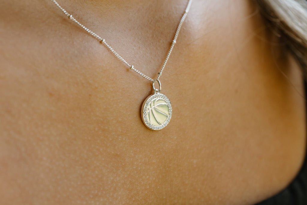 basketball silver charm necklace with crystal detail by Chelsea Charles