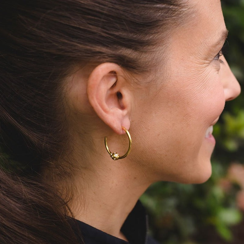 Birdie Gold Mini Hoop Earrings by Chelsea Charles