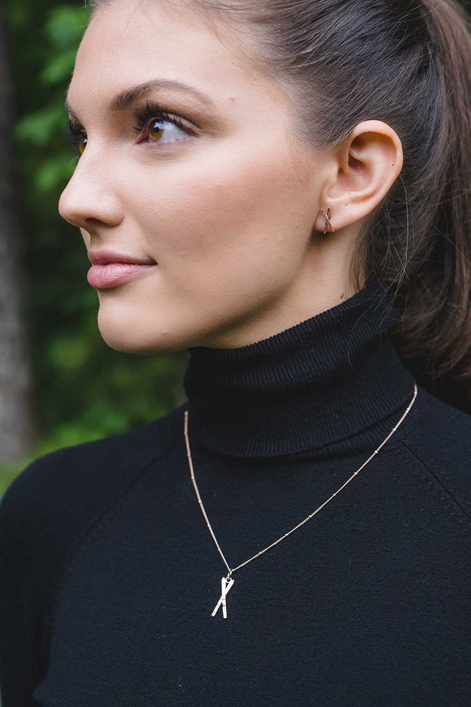 Chelsea Charles Rose Gold Ski Earrings and Rose Gold Ski Necklace